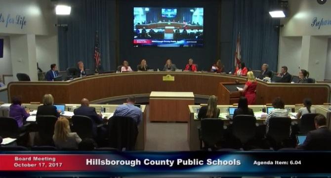 The School Board meeting on October 17, 2017 begins with each of the district representatives sitting beside Jeff Eakins, school superintendent.